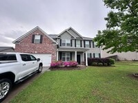Building Photo - Welcome to this spacious 6 bedroom, 4 bath...