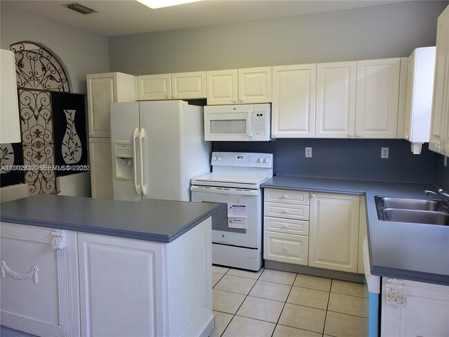 Building Photo - 5560 NW 107th Ave