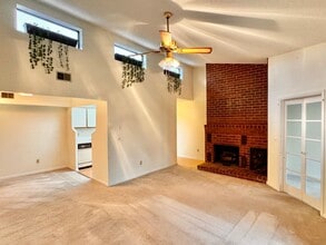 Building Photo - 2 Bedroom/2 Bath Condo near shopping with den, community Pool and more!