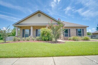 Building Photo - Spacious 4BR Pool Home with Modern Upgrade...