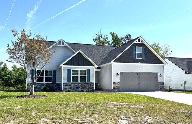 Building Photo - Beautiful home! Convenient to the city with all shopping!