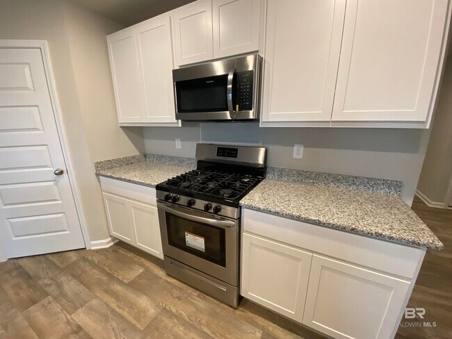 Building Photo - 8359 Harmon St