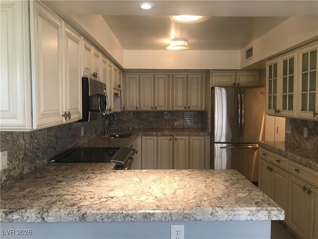 Building Photo - 205 E Harmon Ave