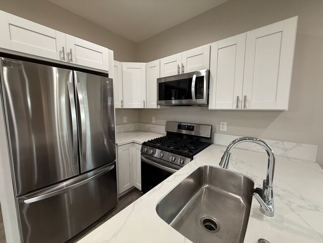 Building Photo - 5317-5319 West Falls VIew Dr.