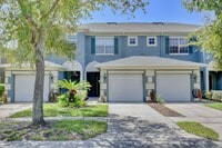 Building Photo - Beautiful 2/2.5 Cozy Townhome with a 1 Car Garage in the Gated Community of Victoria Pines - Orlando