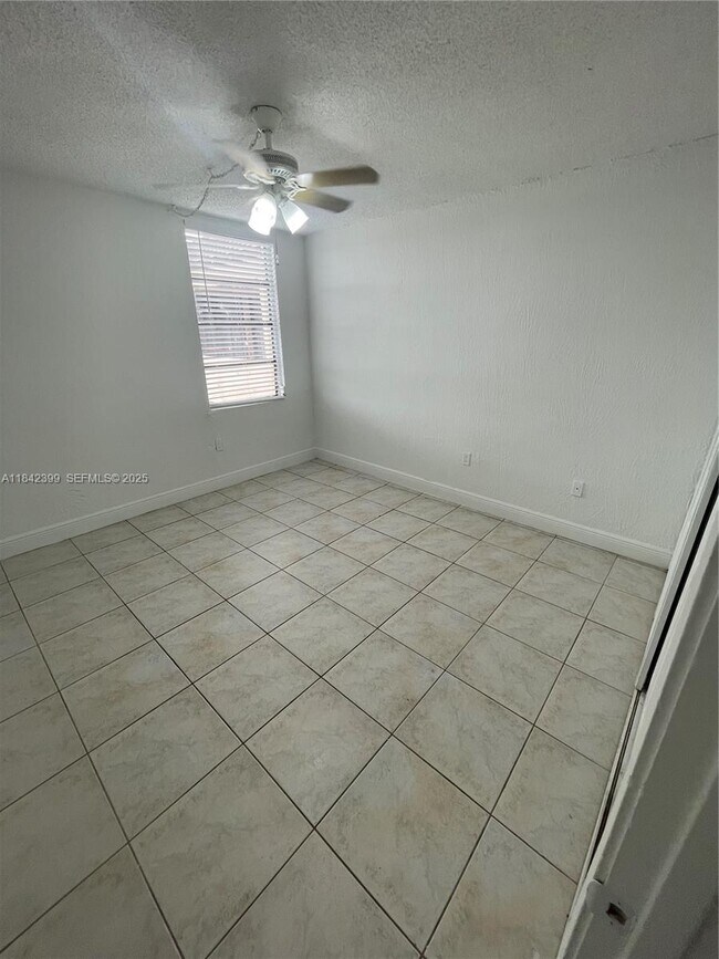 Building Photo - 10500 SW 108th Ave