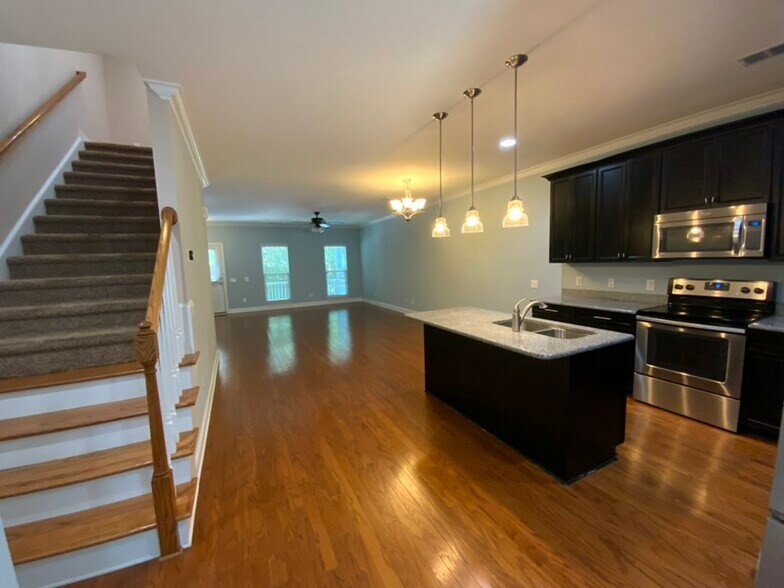 View of living room from Kitchen - 10220 vanguard pkwy