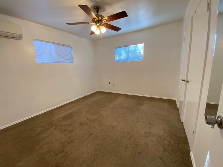 Master bedroom with air conditioning and carpet - 1976 Missouri St