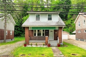 Building Photo - Tucked-Away 3bed 1 bath Treasure with City Perks Just Minutes Away