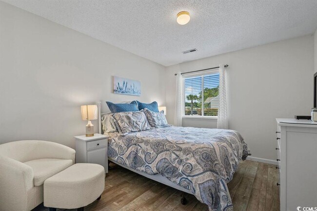 Building Photo - Ground floor, 2 bedroom, 2 bath, end unit- 10 mins to Surfside Beach.