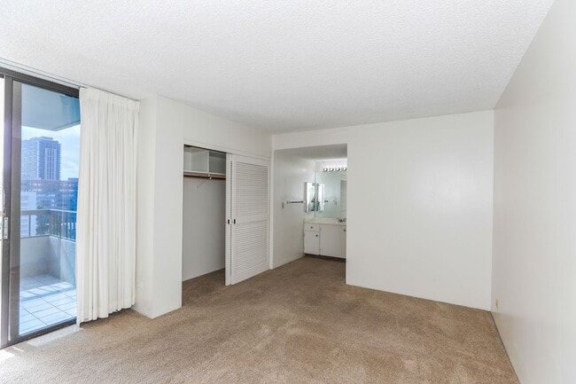 Building Photo - Aloha Towers - 2 bedroom, 2 bath corner unit with 1 covered parking stall