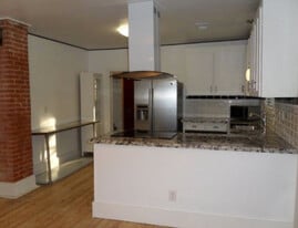 Open Concept Kitchen with Granite Counter - 200 S Saeger St
