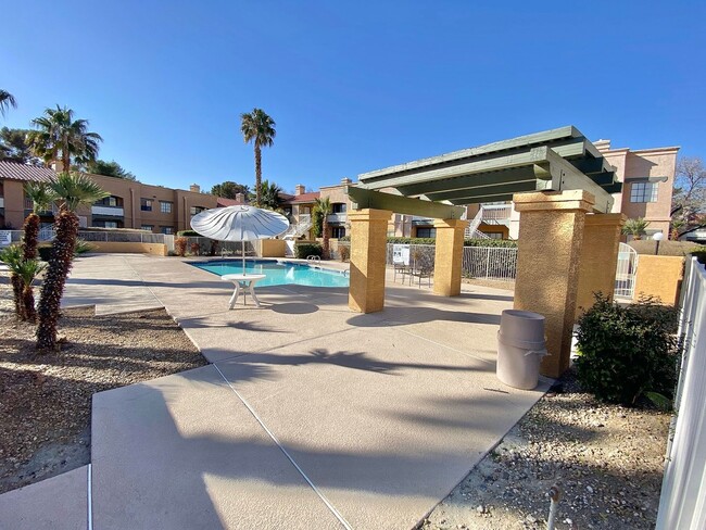 Building Photo - CONDOMINIUM IN A GATED COMMUNITY WITH 2 BE...