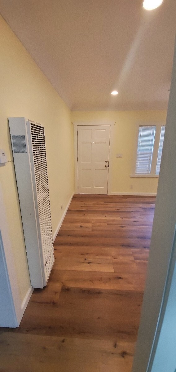 Living Room w Heater - Dining Room View - 1823 Maine Ave