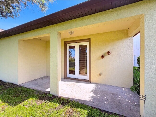 Building Photo - Waterfront 4 Bedroom Home in Eagle Creek Golf Community – Lake Nona
