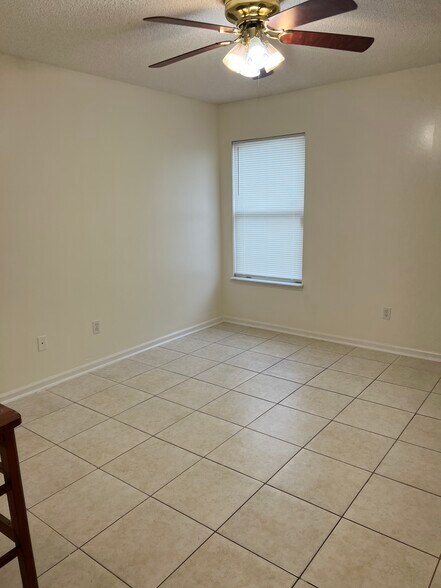 All 3 bedrooms generously sized second bedroom with a walk-in closet and ceiling fan, providing both - 5374 Lacy Jane Way