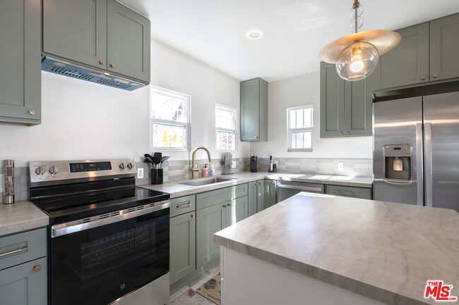 Building Photo - 7853 Brighton Ave