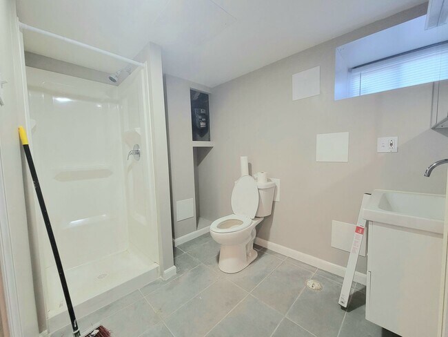 Building Photo - Stunning 4-Bedroom Townhome with Finished ...