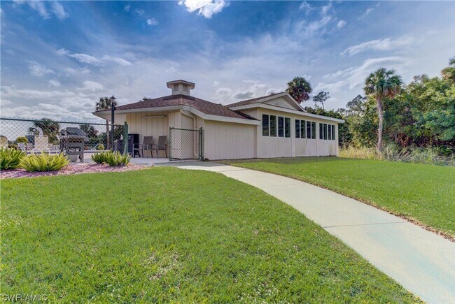 Building Photo - 55+ Charming first-floor condo nestled in the serene Fairways 3 Condominiums