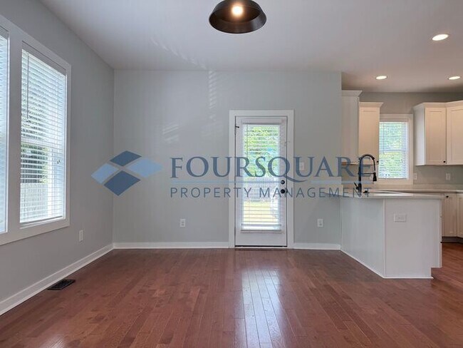 Building Photo - Modern 3-Bed / 2.5-Bath Home with Granite Kitchen, Fenced Yard & Private Balcony – Walkable to Do...