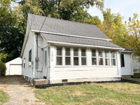 Building Photo - 4 Bedroom Home with garage/workshop combo (has electricity)