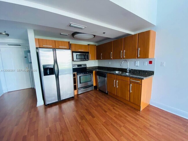 Building Photo - 6362 Collins Ave