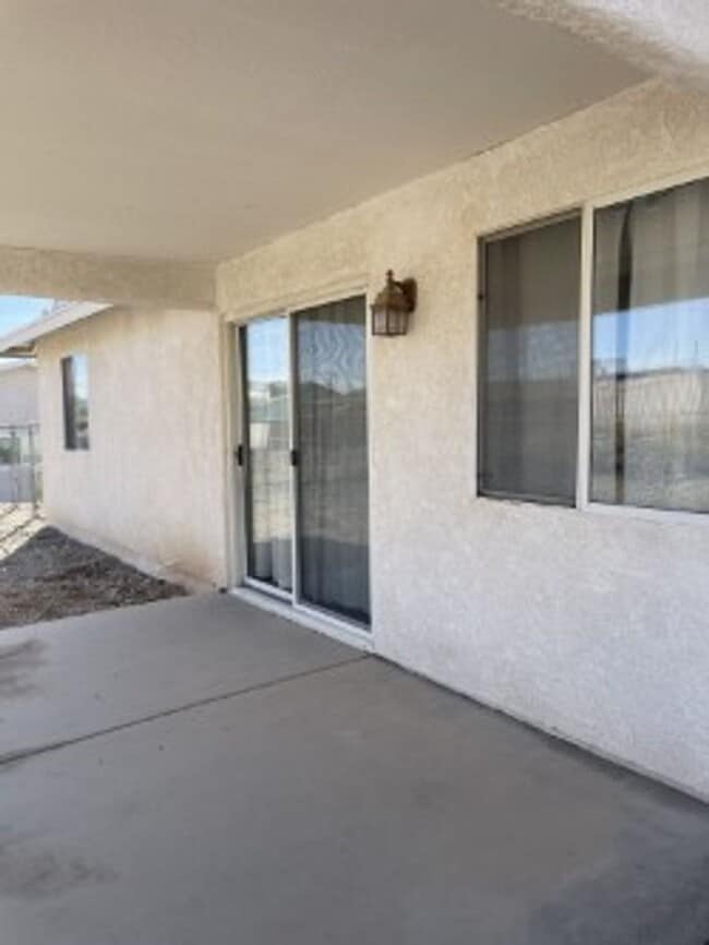 Building Photo - North side home, pet friendly with fenced back yard.