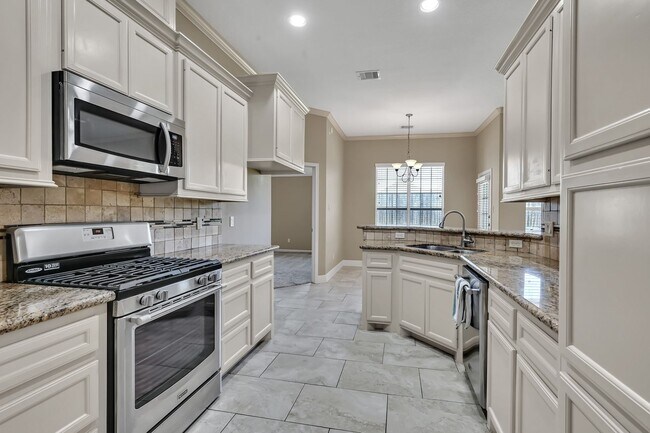 Building Photo - One story, and a 3-car garage!