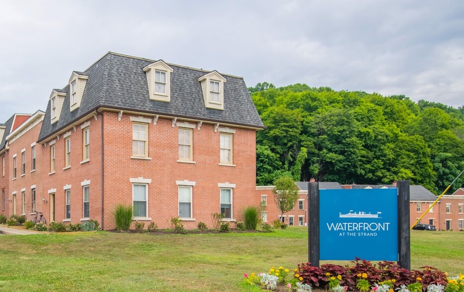 Welcome to Waterfront at the Strand, where modern living meets serene surroundings. Enjoy spacious layouts, lush landscapes, and a community that feels like home. Explore your new lifestyle today! Contact us for more information. - Waterfront at the Strand