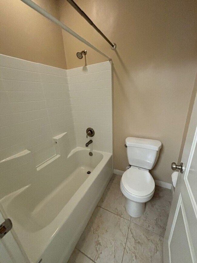 Building Photo - Elegant 4-Bedroom Home with Paid Solar in Gated Village Green Community