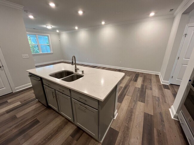Building Photo - Newly Built 4BD, 3BA Cary Townhome with Modern Amenities and Screened-In Patio