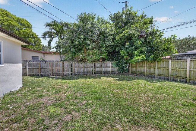 Building Photo - Renovated 3BR/2BA Corner Single-Family Home – Large Fenced Yard, NO HOA
