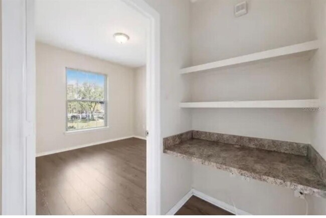 Building Photo - 10209 Courtney Palms Blvd