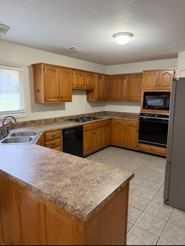 Building Photo - 6700 Kirby Oaks Cove N