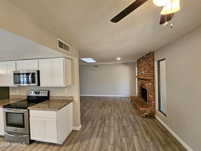 Building Photo - 2420 W Kiowa Ave