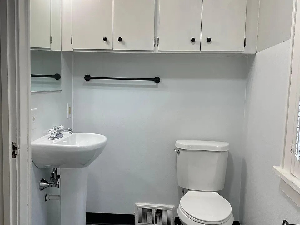 Bathroom 2 Upstairs hallway - 2318 Storm St