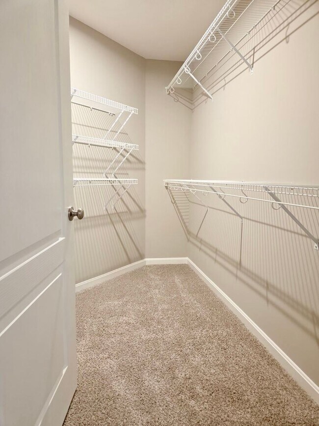 Building Photo - Exquisite brand new condo w/everything! Ground floor, no stairs, attached garage