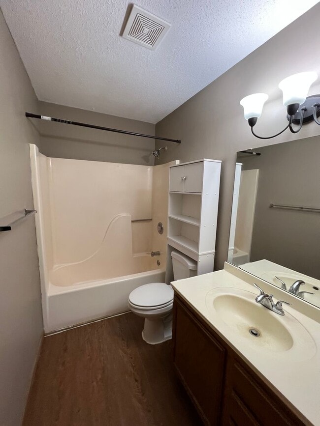 Building Photo - NE House for Rent 4 bedroom 2 full bathroom fenced in yard 2 Car attached garage.