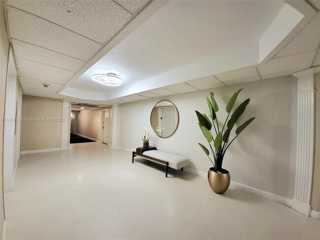 Building Photo - 5600 Collins Ave