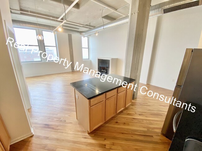 Building Photo - 2-Bedroom  in Western Auto Lofts