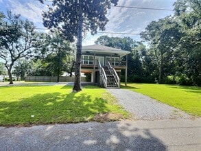 Building Photo - 2-Bedroom, 2-Bathroom home on a large corn...