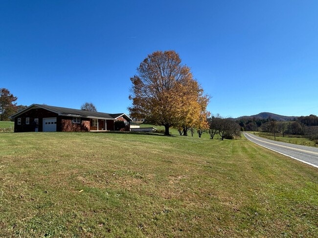 Building Photo - Large Brick Ranch with Finished Basement a...