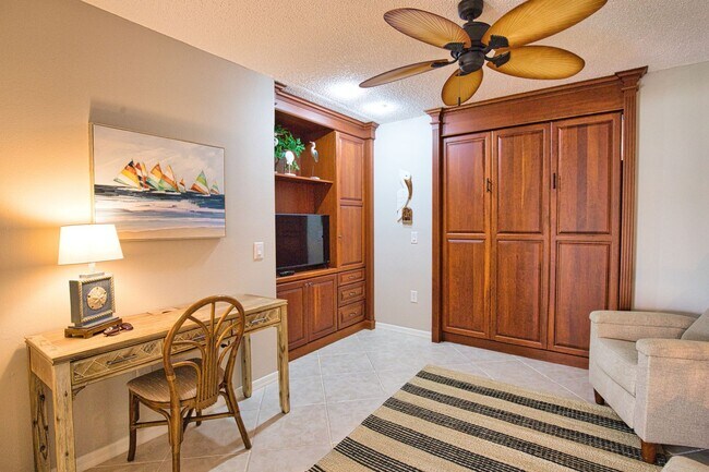 Building Photo - Seasonal Short-Term 2 Bed 2 Bath Heated Pool Villa with a Den in Harrington Lakes at Planation Go...