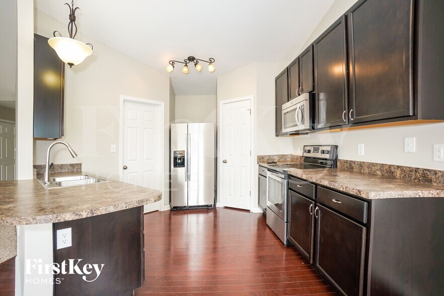 Building Photo - 6055 W Brickell Ln