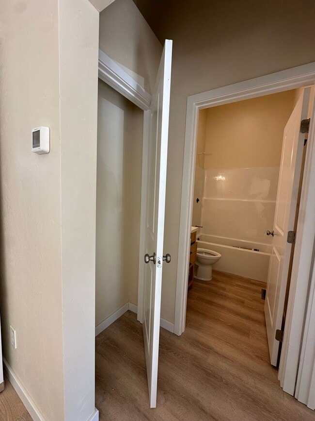 Building Photo - Bright & New 2 Bed / 2 Bath with Vaulted Ceilings & Covered Parking!