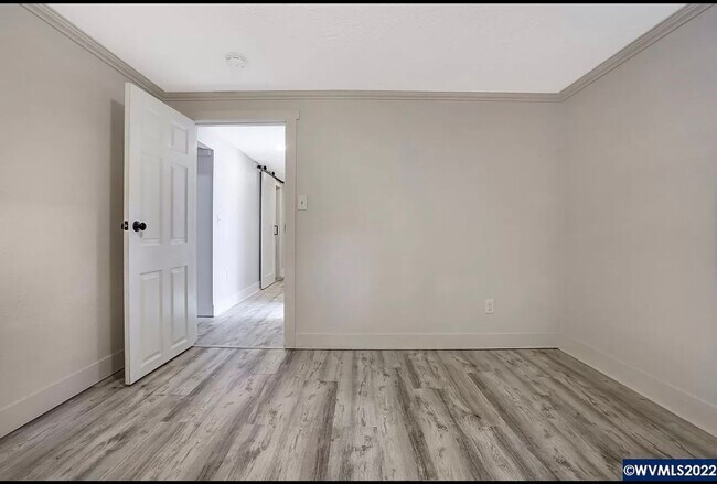 Building Photo - Available Now! 5 bedroom house with large yard and RV parking!