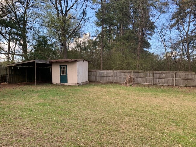Building Photo - 4/2 Fenced Yard and Pet Friendly. SHISD
