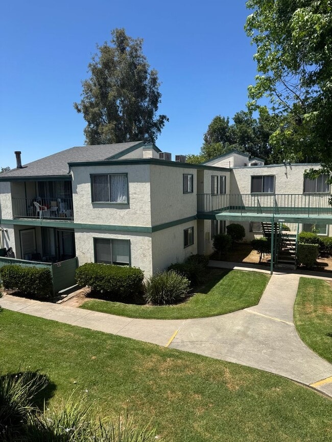 Building Photo - Upstairs two-bedroom 1/12 bath condo avail...