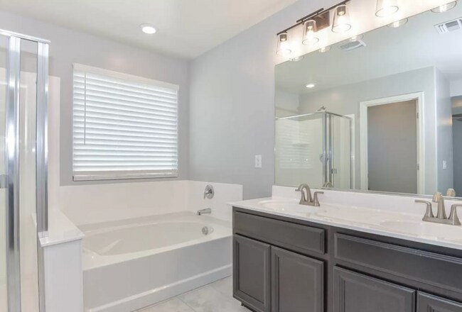 Building Photo - Spacious 2-Story, 3 Bedroom/2.5 Bath Home with 2 Car Garage! Community Pool and Playground!