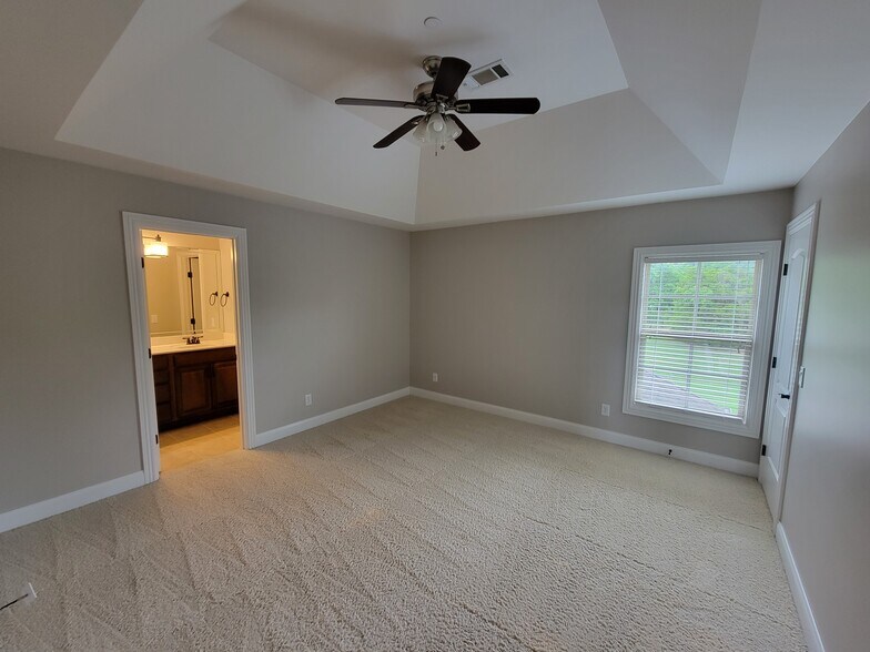 Upstairs Bedroom, Door to Bath - 1005 Brittain Downs Dr